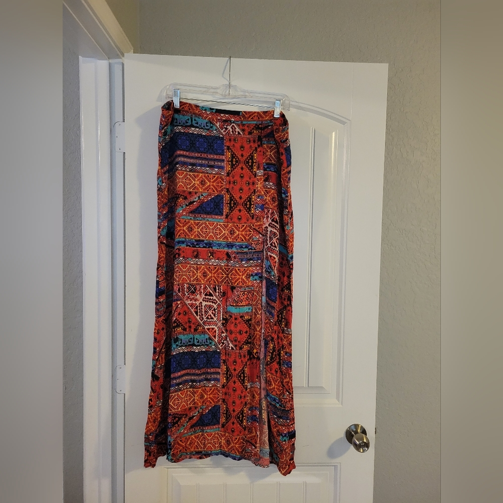 Long Ethnic multi-color split with zipper in back.